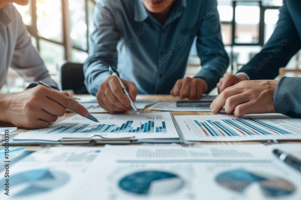 Businessmen hands holding pens pointing to marketing data - Generative AI Businessmen hands holding pens pointing to marketing data - Generative AI