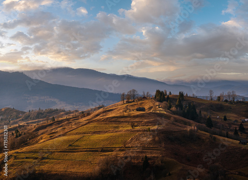 Last good weather days in autumn mountain countryside. Peaceful picturesque Ukrainian Carpathians mountains scene.