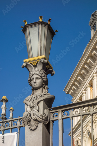 Detail of an ornamental lamppost in Madrid, Spain.