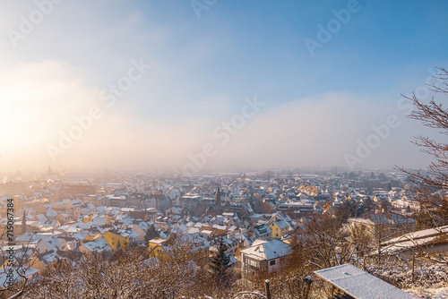 winter in the city with warm sun and snow near Marburg