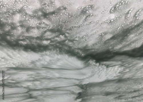 Soap and water at a car wash with imagination looking like the ocean or space