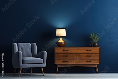  a living room with a blue wall and a blue chair next to a dresser with a potted plant on it.