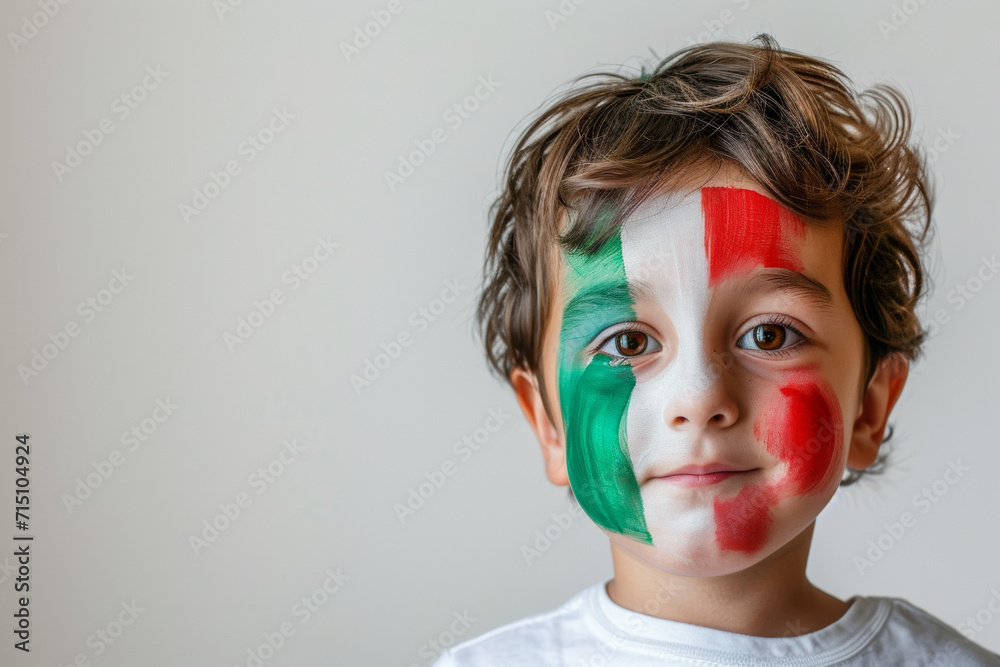 Little child fan of Italy with the face painted with italian colors. Isolated in white background. Little child fan of Italy with the face painted with italian colors. Isolated in white background.