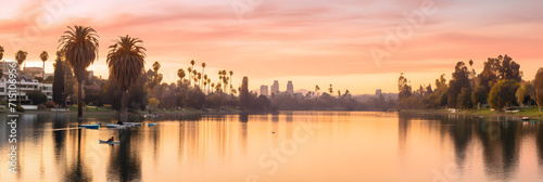 Tranquil Sunset over Echo Park Lake with Swan Boats Docking-Palm Trees Silhouetted against LA Skyline photo