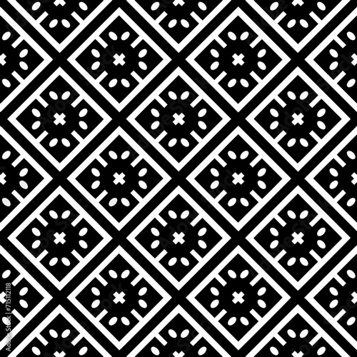 A white background with black design.Seamless texture for fashion, textile design,  on wall paper, wrapping paper, fabrics and home decor. Simple repeat pattern. Geometric patterns.
