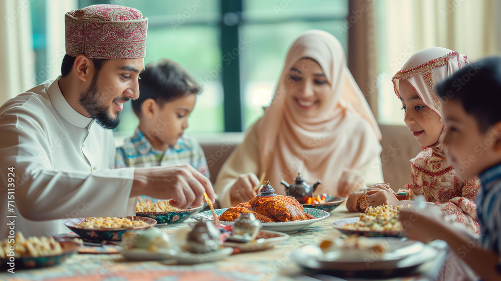 A joyful Muslim family enjoying a festive meal together during Muslim holiday