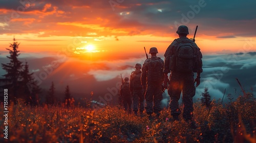 Silhouettes of army soldiers in the fog against a sunset, marines team in action