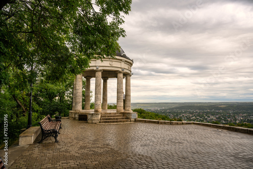 Rotunda Aeolian Harp in Pyatigorsk, Stavropol Krai, Russia. It is landmark of city installed in 1831. Old arbor on Mashuk mount in Caucasian Mountains in summer. Travel, sky, park theme photo