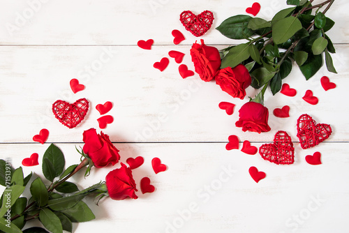 Valentine's day concept. Red roses, hearts and gift boxes on a white background. Mockup, place for text.