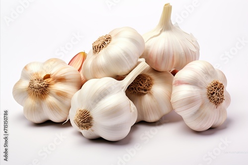 Whole fresh garlic bulbs isolated on a white background for culinary ingredient and cooking concept