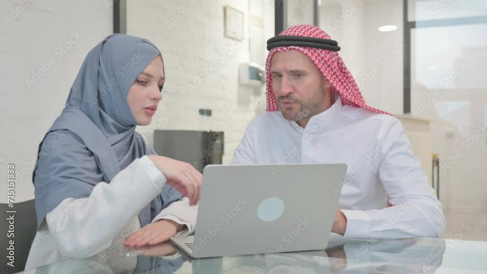 Muslim Woman Talking with Arab Man for Work Muslim Woman Talking with Arab Man for Work