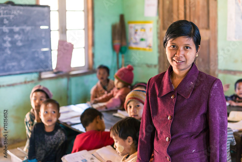 Teacher and children Inside a local primary school, Myanmar