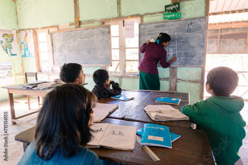 Children in the classroom during a lesson at local school, Kempetlet, Myanmar photo