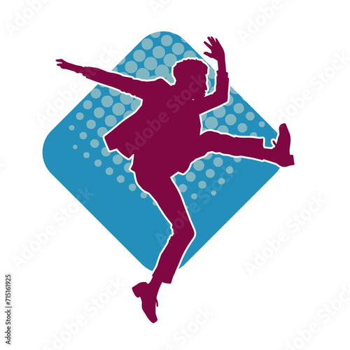 Silhouette of a slim man dancing pose. Silhouette of a male dancer in action pose.
