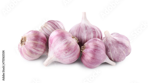 Pile of fresh raw garlic heads isolated on white