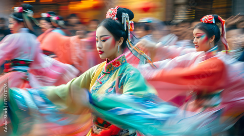 woman dancing with others in traditional Chinese costume