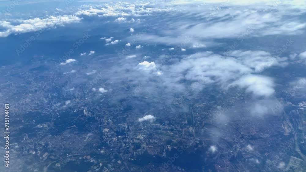 Beautiful aerial view seen through window of flying airplane Beautiful aerial view seen through window of flying airplane