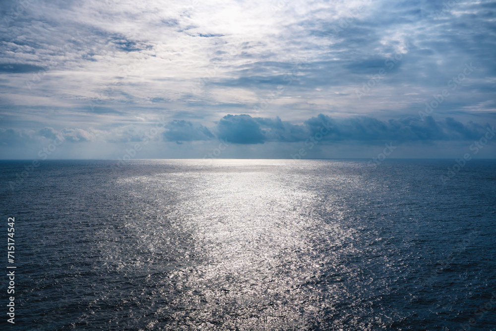 Quiet Atlantic ocean, and cloudy sky. Seascape background