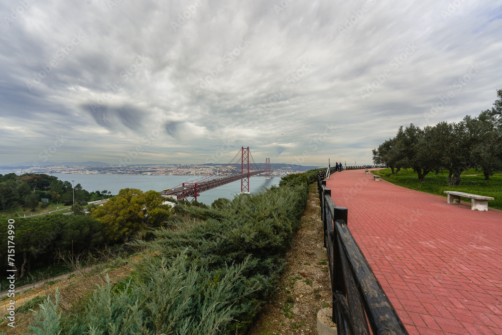 The 25 de Abril Bridge, a suspension bridge connecting the city of Lisbon, capital of Portugal, to the municipality of Almada