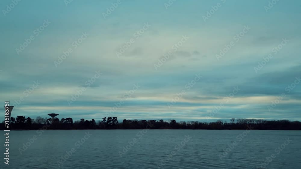 Drone view of Saint-Quentin Pond, It's the largest body of water in the Yvelines region. This natural reserve serves as a wintering ground for numerous migratory birds. Over 230 bird species. Drone view of Saint-Quentin Pond, It's the largest body of water in the Yvelines region. This natural reserve serves as a wintering ground for numerous migratory birds. Over 230 bird species.