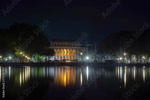 night view of the city with water reflection