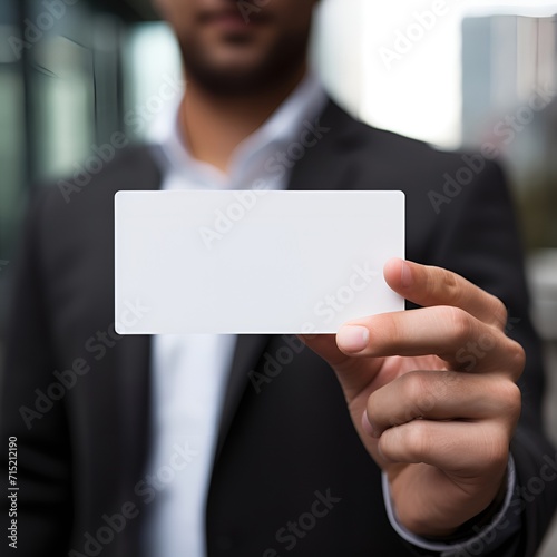A person holding a blank business card, ready for networking , person, holding, blank business card, networking