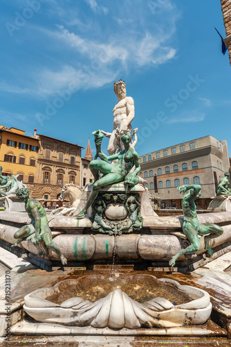 Historical landmark Neptune Sculpture - Fontana del Nettuno - Neptun fontain - near Palazzo Vecchio, Florence, Tuscany, Italy © leeyiutung