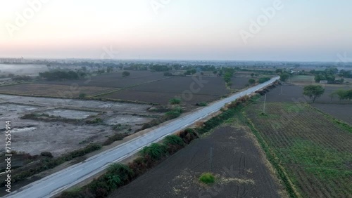 Sunrise over tranquil Nawabshah village, Sindh photo