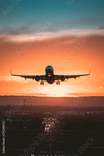 Plane taking off at golden hour