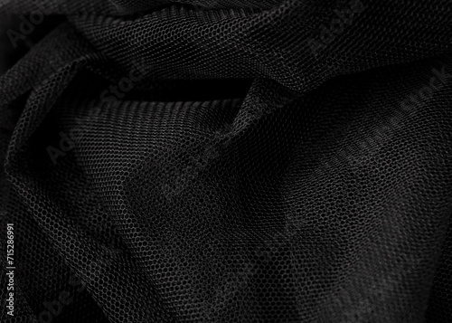 Black fabric as an abstract background. Texture