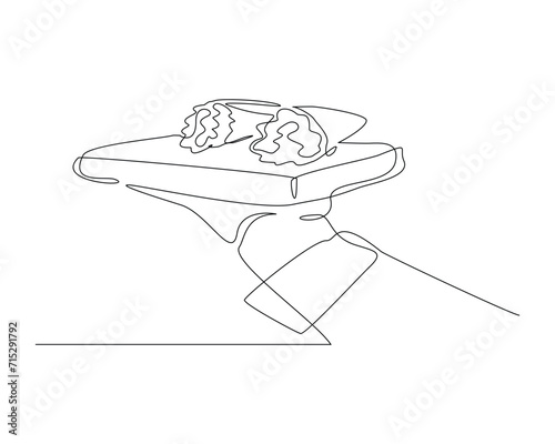 Continuous single line sketch drawing of waitress hand holding tray with shawarma kebab burrito meat. One line art of delicious meal fast food restaurant serving vector illustration