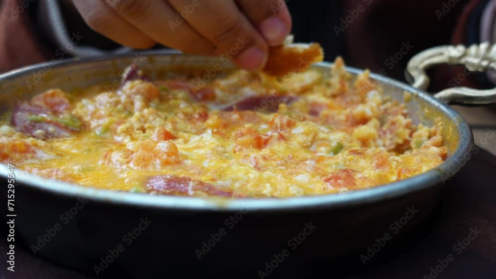 Turkish Menemen omelet in a frying pan. . Turkish Menemen omelet in a frying pan. .