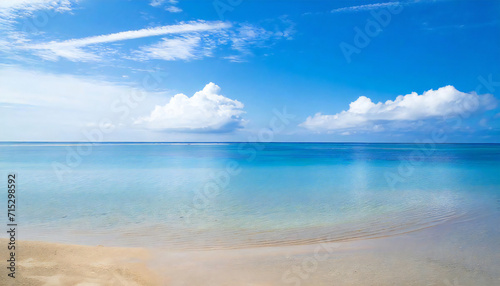 青空が広がる沖縄の海のイメージ。Image of the sea in Okinawa with a blue sky. photo