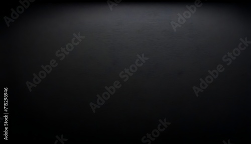 Black satin background, light from above  photo