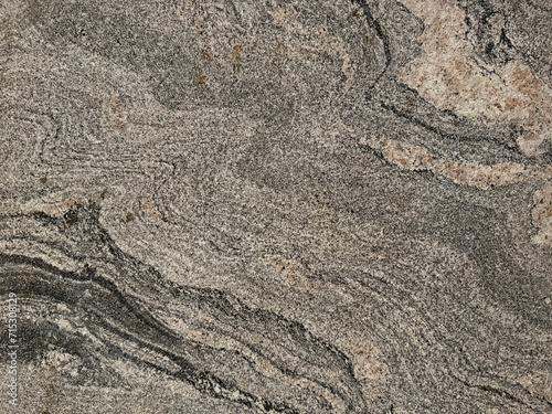 Close up texture of natural stone granite slab pattern in marble looking veining and grains, Seamless texture
