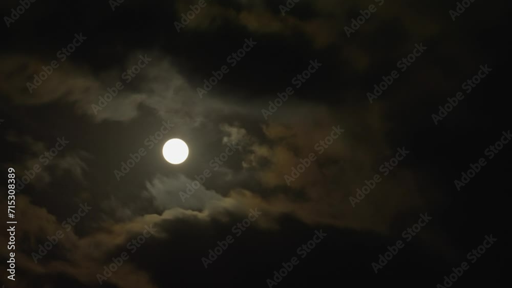 Clouds passing by moon at night. Full moon at night with cloud real time. Clouds passing by moon at night. Full moon at night with cloud real time.