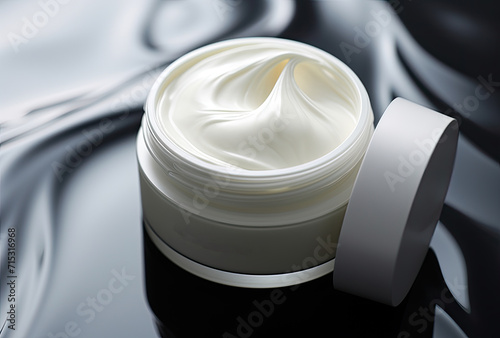 A skincare cosmetics cream jar product displayed against a textured background, featuring ample copy space. photo