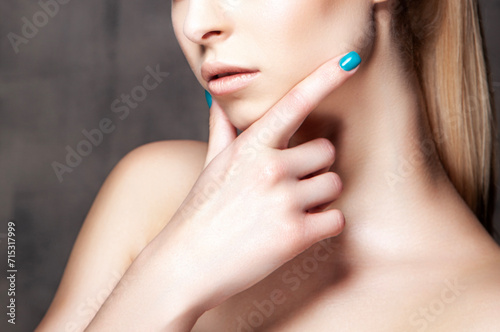 Lips, neck and shoulder of beauty model girl. Natural nude make-up, clean skin