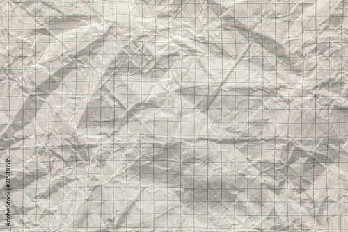 Fotografi Close-up of graph ruled composition or exercise book paper with rough crumpled t