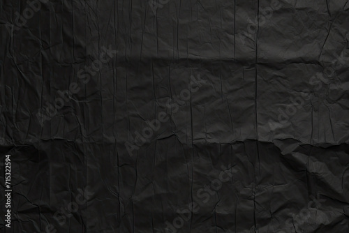 Dark black grey paper background creased crumpled surface, Old torn ripped posters scary grunge textures. black friday paper banner