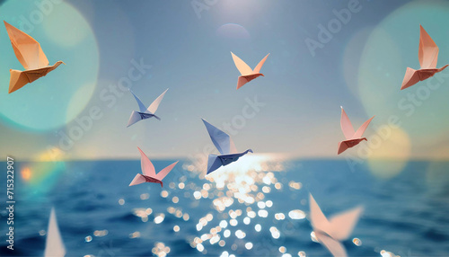 origami birds flying in the sea