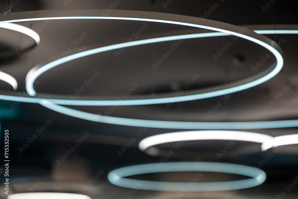 Circular pendant lights hanging from the ceiling