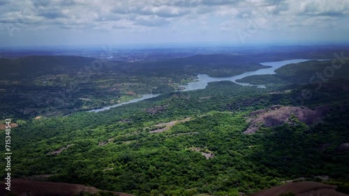 beautiful drone shot of Savandurga hills,  it is situated at 60 km west of Bengaluru, Karnataka, India. It is the largest monolith hills in Asia famous for trekking, rock climbing & a pilgrim. photo