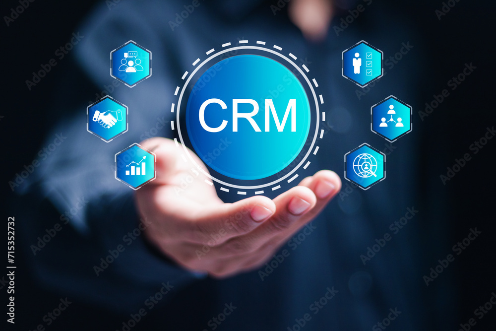 CRM Customer Relationship Management concept. businessman hold virtual customer network management and development of customer information exchange, social media, digital online. CRM Customer Relationship Management concept. businessman hold virtual customer network management and development of customer information exchange, social media, digital online.