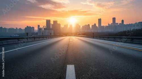 Empty highway in the middle of city at sunset © imlane