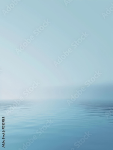 Minimalist blue gradient background resembling a tranquil water surface.