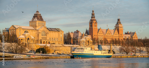The historic buildings of Haken Terrace in Szczecin reflected in river
