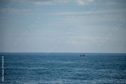 Boat seen sailing across ocean