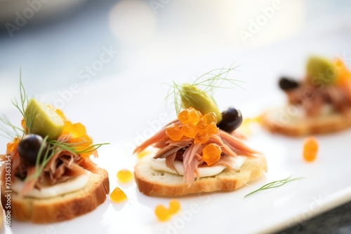 close-up of shredded duck confit on crostini photo