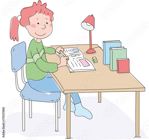 Little female student studying at her desk.